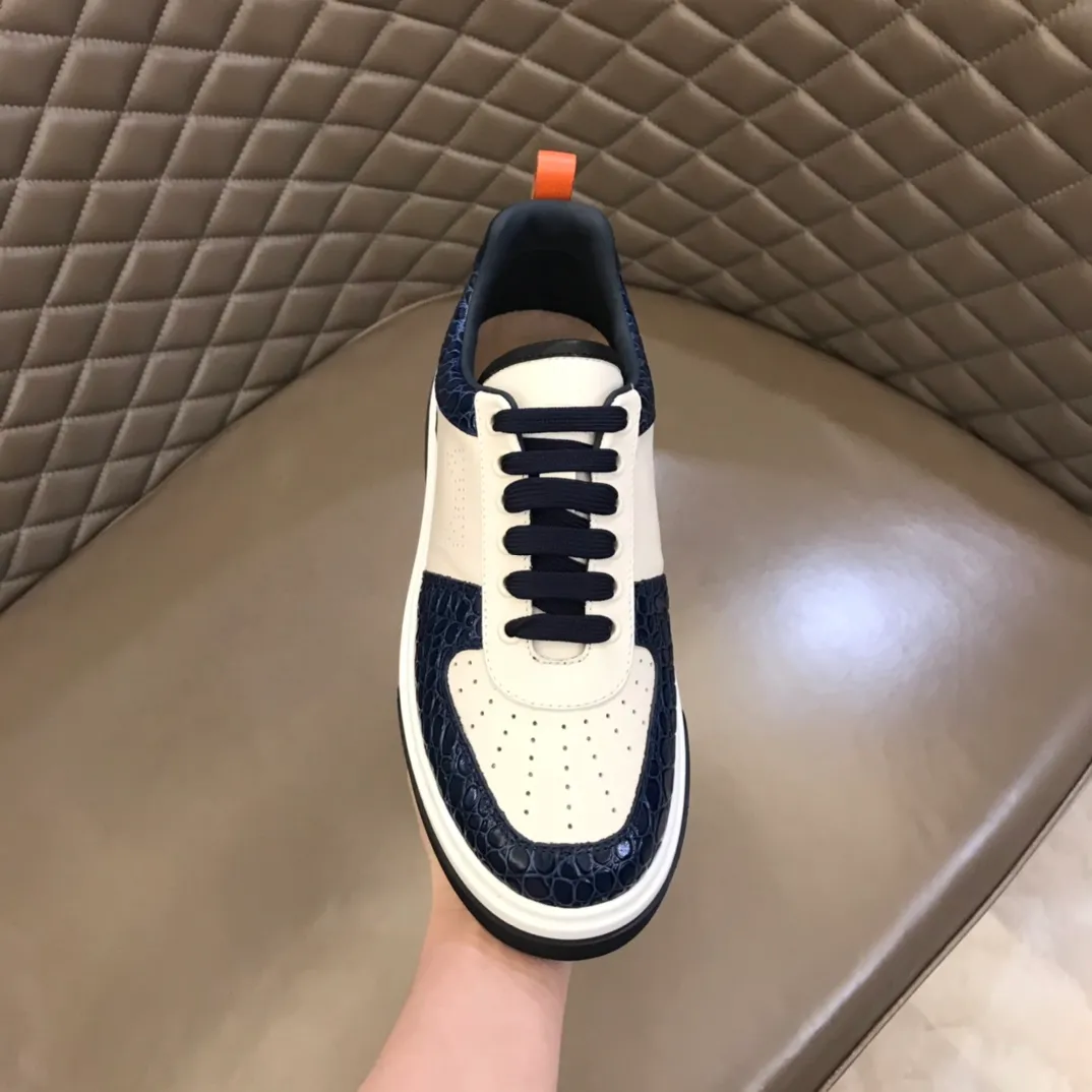 p420 "Salvatore Ferraga**" men's low-cut fashion sneakers. This casual shoe has a novel structure and is made of soft calfskin. The contrasting color elements on the upper highlight the bold and avant-garde atmosphere. The first-layer cowhide lining is high-end and comfortable. Energetic and fresh, these shoes can be worn with casual looks or add a touch of street style to elegant trousers.  Size: 38-44